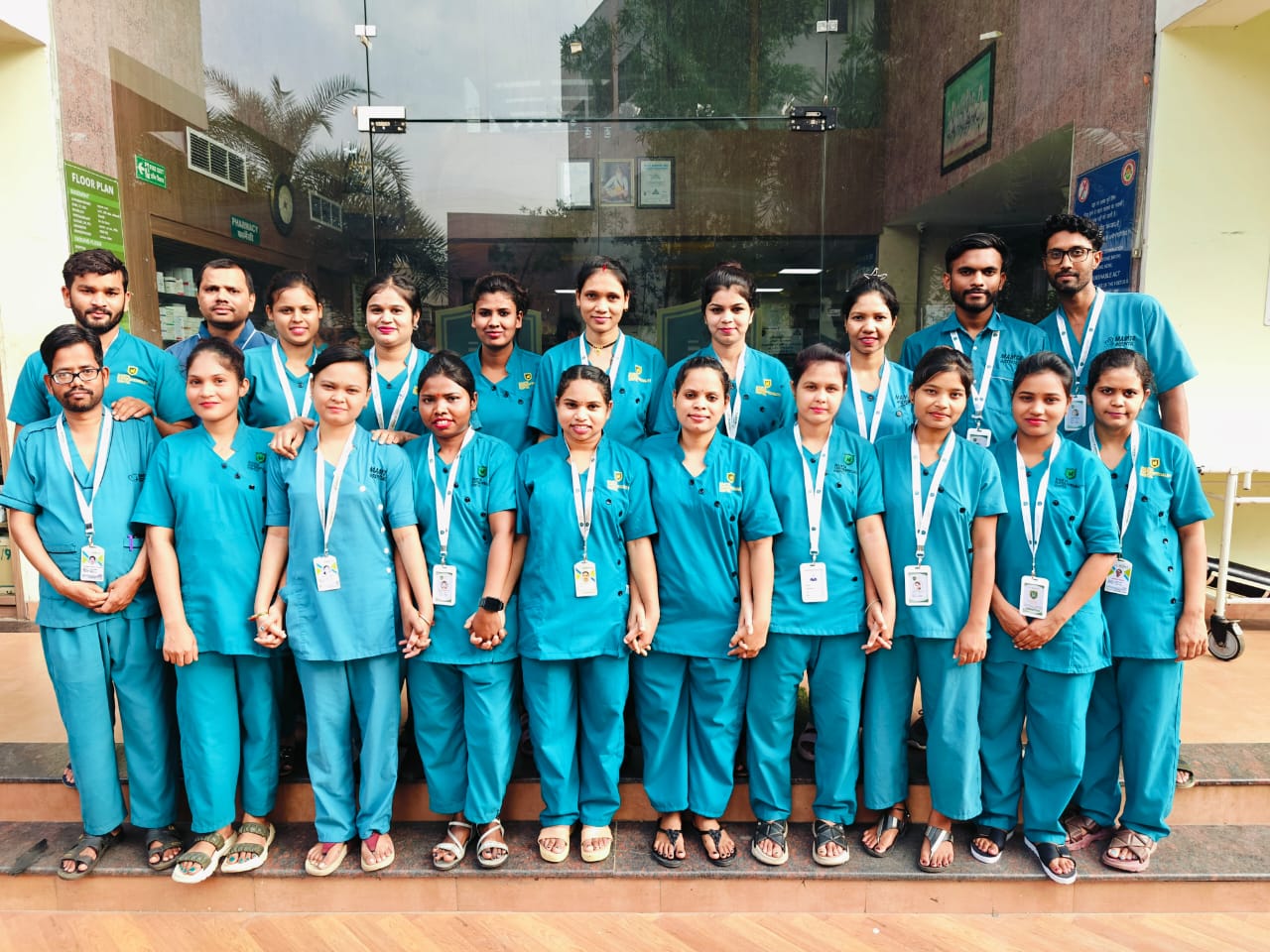 Group photograph of Mamta Hospital nursing and clinical team standing outside the hospital